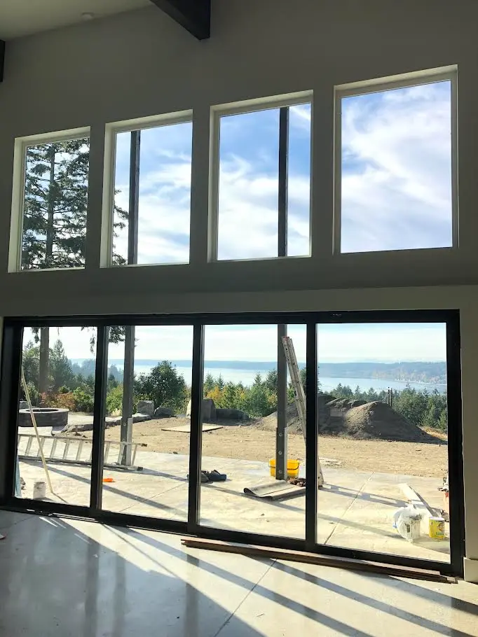 Exterior cleaning in Gig Harbor, WA on waterfront home windows by Father & Son Window Cleaning